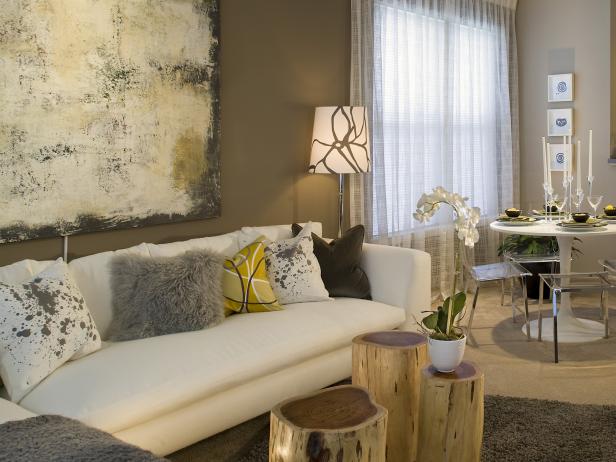 Brown Living Room With Yellow Accents and White Sofa