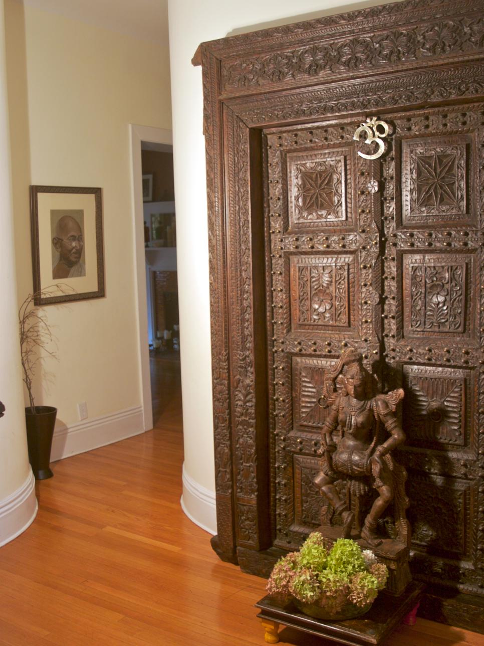 AsianThemed Entryway with Detailed Wall Decor HGTV