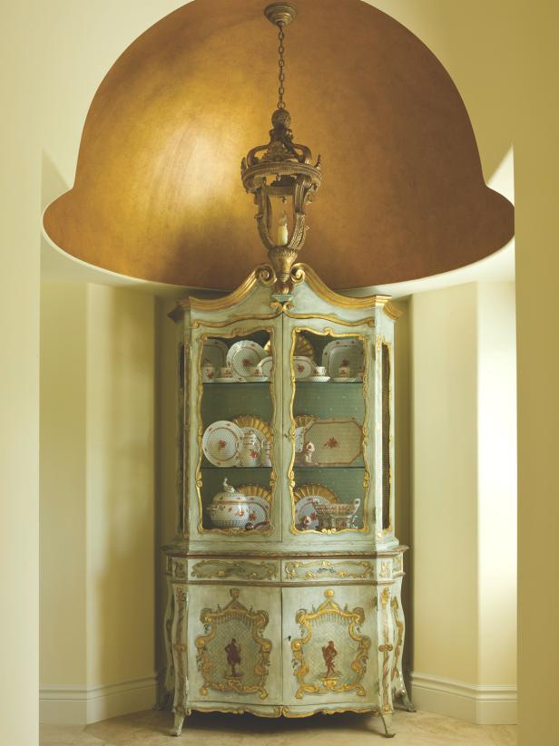 Traditional Gold Foyer With Antique Buffet Holding China 