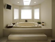 White Bathroom With Tub and Natural Light