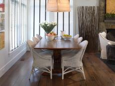 White Wicker Chairs and Wood Dining Table With Basket Pendant Light
