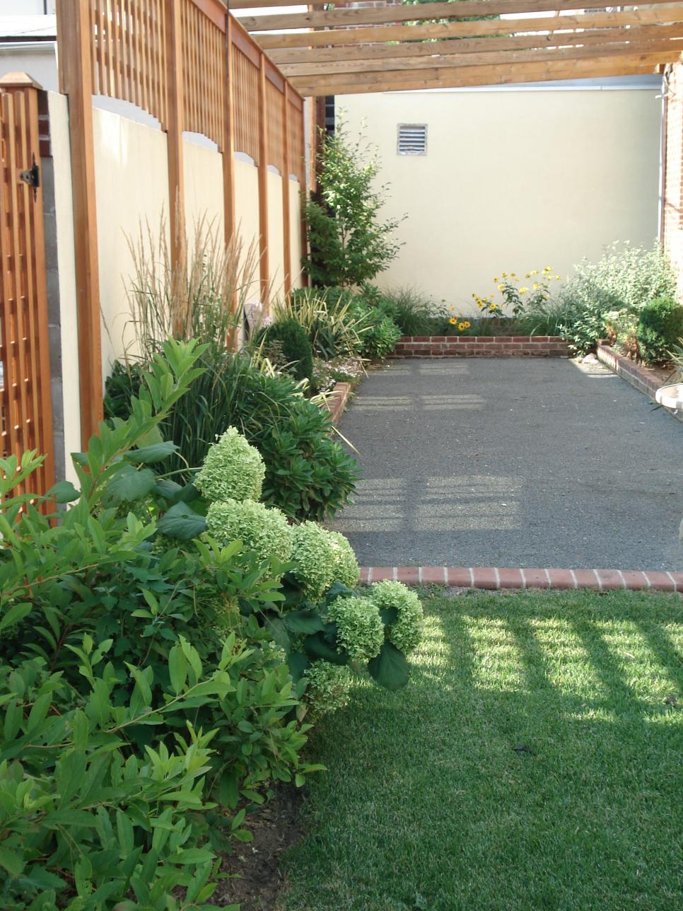 Wood Pergola and Landscaped Bocce Ball Court HGTV