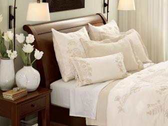 Sleigh bed with white linens