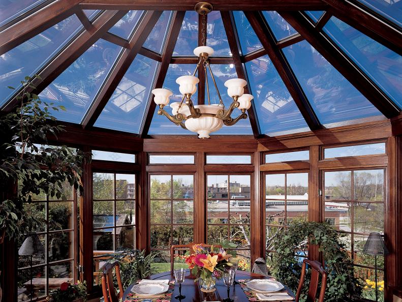 Traditional Dining Room in a Wood and Glass Atrium 