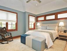 Blue Bedroom With Mahogany-Framed Windows