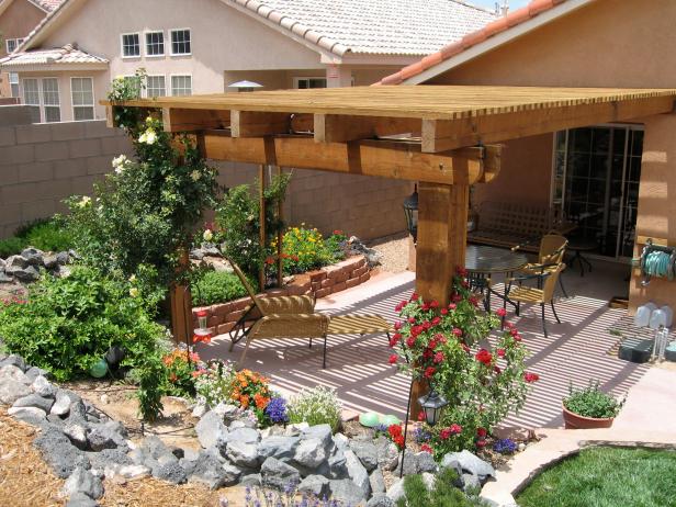 Southwestern Patio With Rock and Floral Landscape
