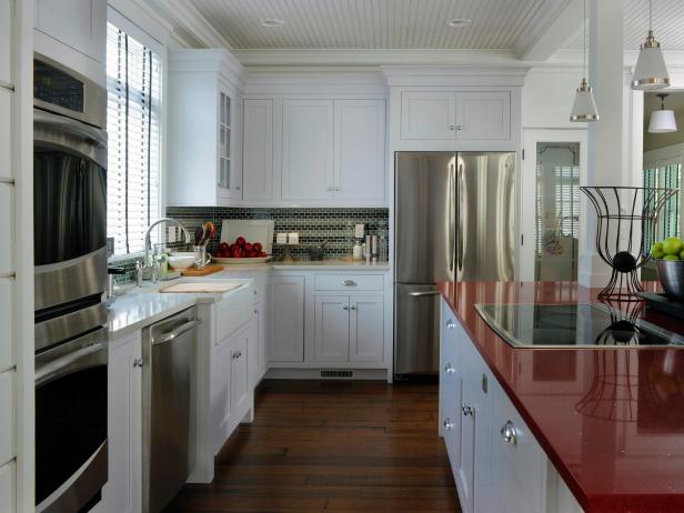 White kitchen with red island countertop