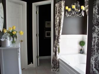 Black and White Bathroom With Toile Curtains and Candle Chandelier