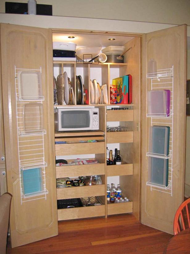 The Kitchen In This Small Apartment Is Hidden In A Closet