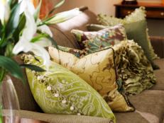 Sofa With Green and Yellow Accent Pillows