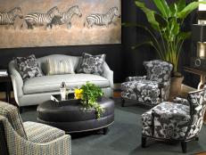 Animal Theme Sitting Area With Upholstered Ottoman and Zebra Artwork