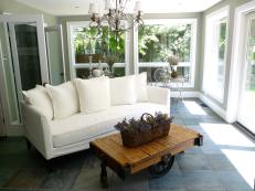 White Sofa and Chandelier in Sunroom