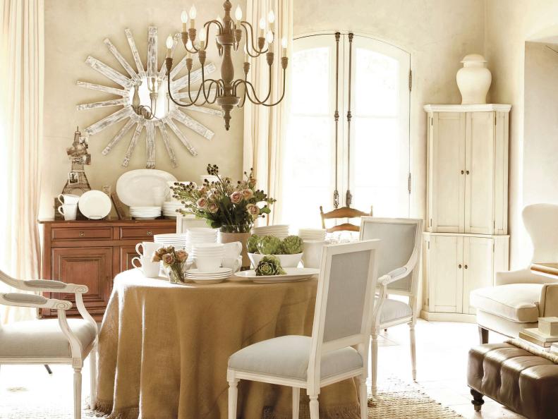 French Country Dining Room With Sunburst Mirror