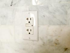 Electrical Wall Socket Offers Two Receptacles