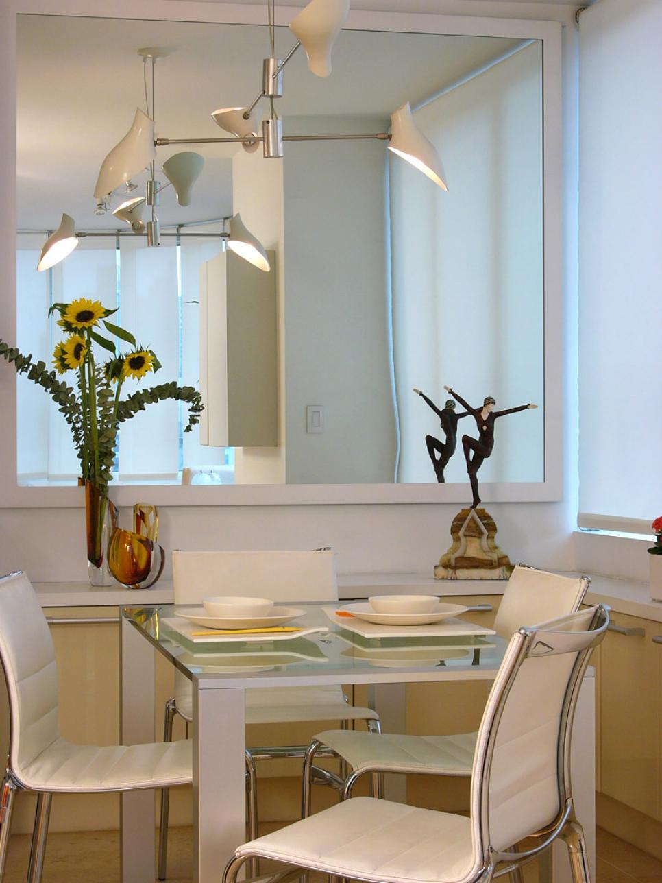 Small Modern White Dining Room With Large Mirror Hgtv