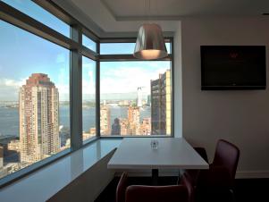 Urban Oasis Dining Table with NYC Skyline View