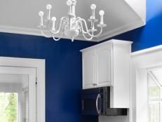 White Kitchen With Bright Blue Walls