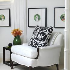 Elegant Sitting Area With White Transitional Armchair