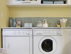Yellow Laundry Room With Mosaic Tile