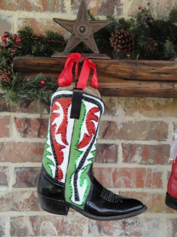 Cowboy Boot Christmas Stocking With Red & Green Details on Wood Mantel