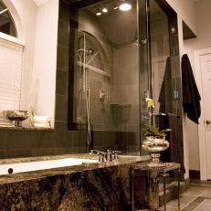 Contemporary Neutral Bathroom With Granite Bathtub and Glass Shower