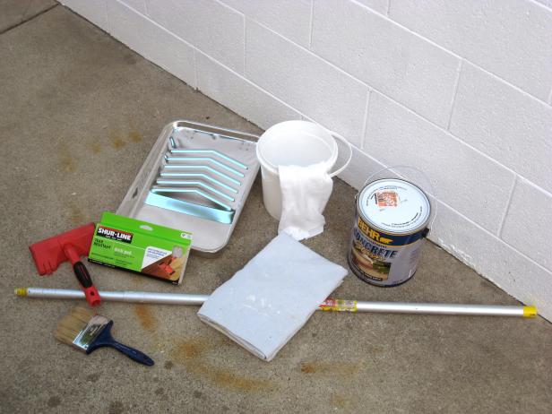 Bucket, Washcloth, Paint Tray and Paintbrushes for Staining Concrete