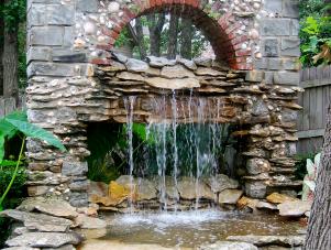 Natural Stone Waterfall into Pond