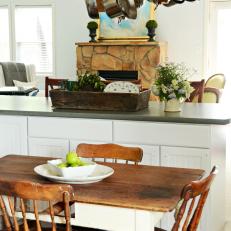 Rustic Dining Room with Hanging Pots and Pans