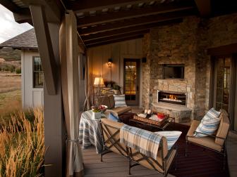 Outdoor Room With Stone Fireplace and Flat Screen TV 
