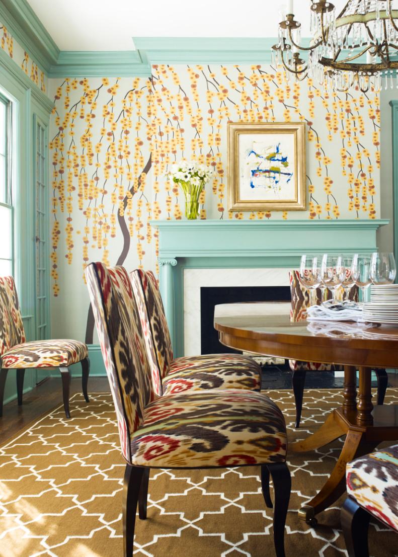 Eclectic Dining Room With Floral Wallpaper and Ikat Chairs