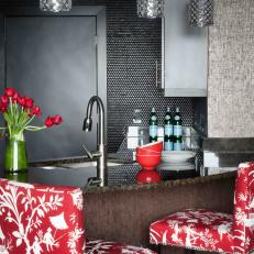 Contemporary Black Metallic Kitchen With Red and White Bar Chairs 