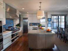 White Kitchen with Blue Backsplash and Gray Kitchen Island