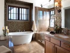 All glamour and luxurious fixtures, the master bath offers a spa escape.