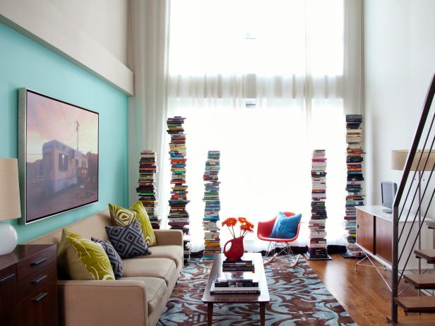 Natural Light in Living Room Highlights Stacks of Books