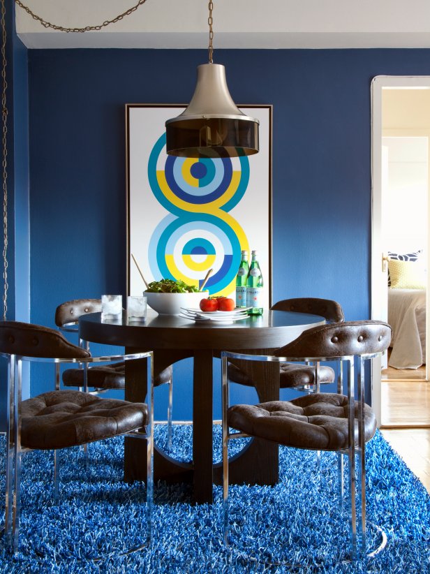 Contemporary Dining Room With Dark Wood Table and Blue Shag Carpet