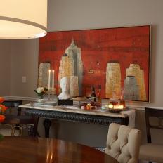 Classy Dining Area With Large Artwork