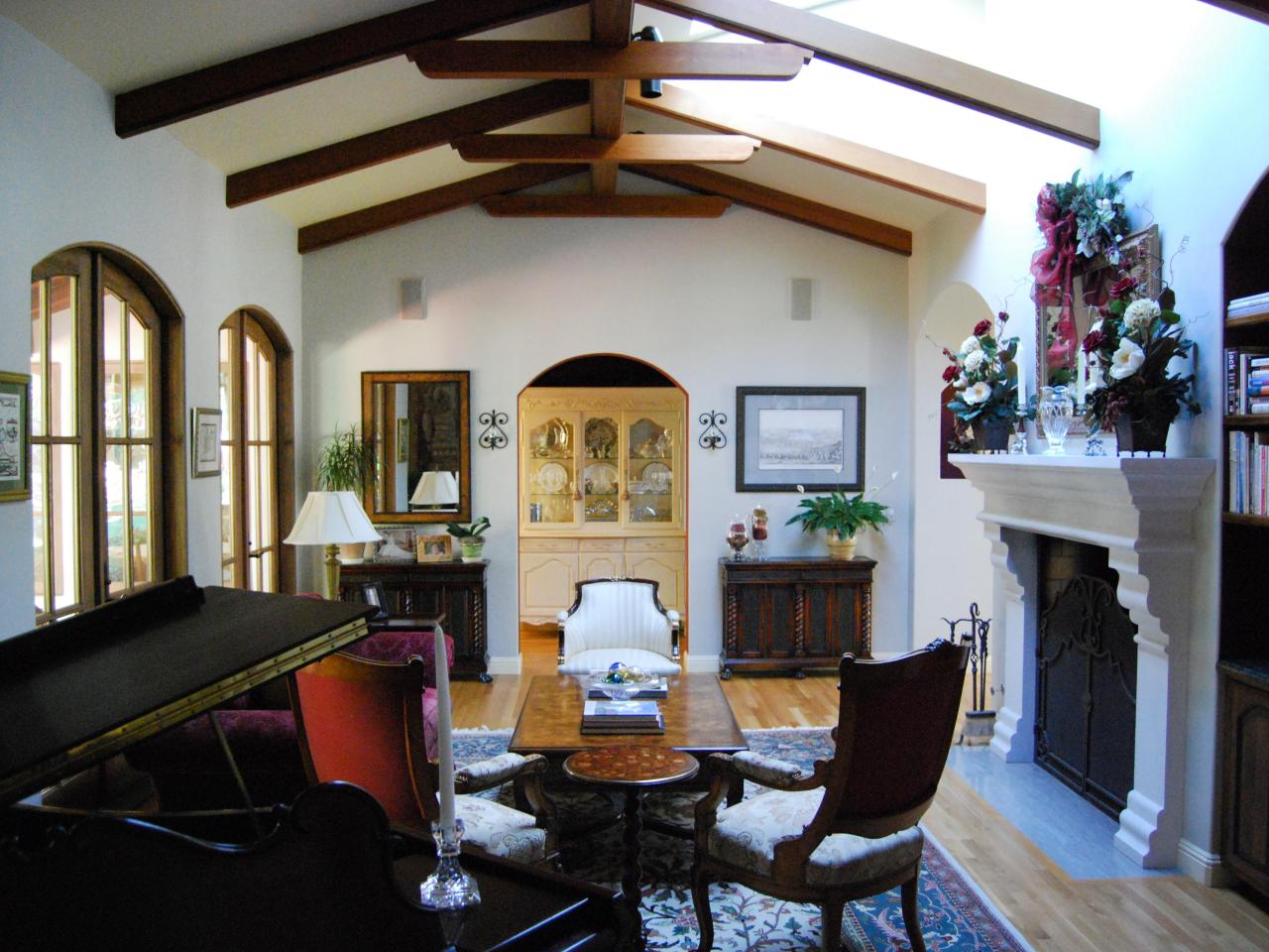 Spanish-Style Living Room With Wooden Ceiling Beams | HGTV