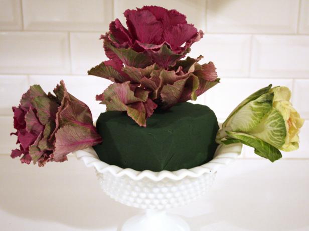 Three Pieces of Kale Inserted Into Floral Foam