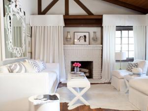 White Living Room with Exposed Ceiling Beams