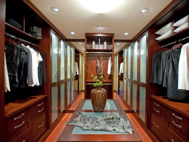 Long Walk-In Closet With Wood Storage Space and Recessed Lighting