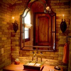 Old World Bathroom Vanity With Arched Brick Wall