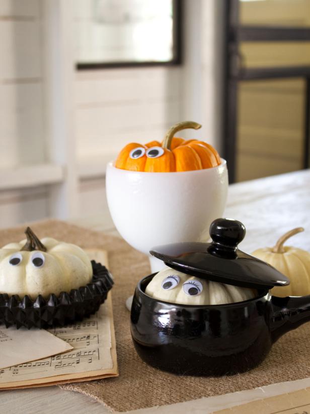 Miniature Pumpkins With Googly Eyes in Small Dishes