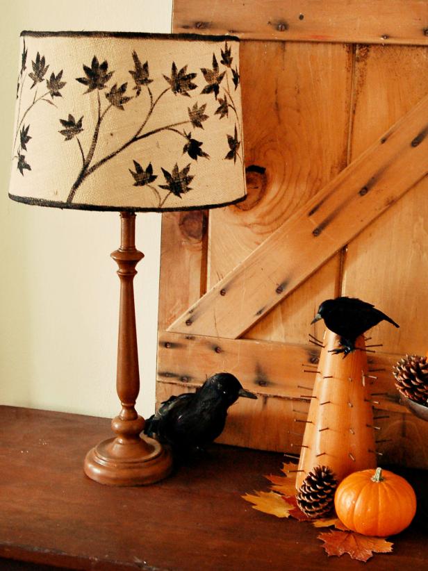 Give a plain lampshade autumnal appeal by stenciling it with fall leaves. Our <a href=&quot;http://www.hgtv.com/handmade/how-to-create-a-fall-leaf-lampshade/index.html&quot;>free printable template</a> makes this project is a snap, even for beginning crafters.