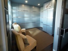 Contemporary Blue Sitting Room With Neutral Chairs 