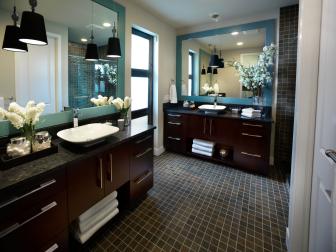Bathroom With Contemporary Wood Vanities, Blue Mirrors and Tile Floor