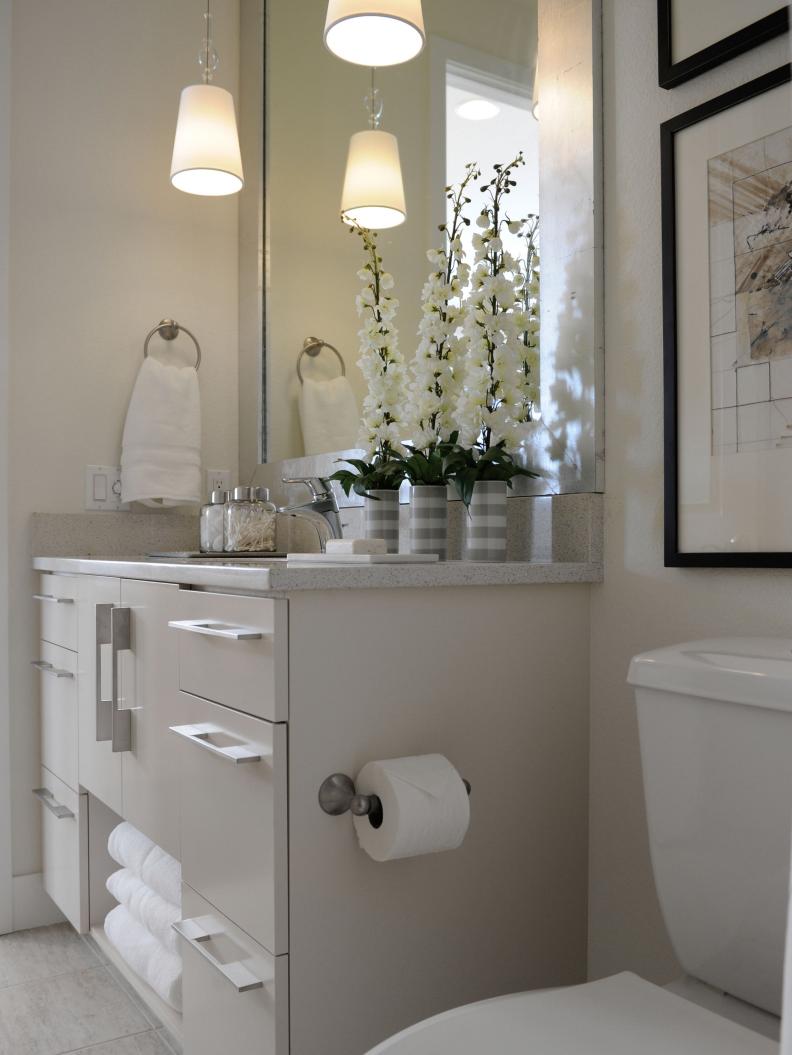 Cream Vanity With Modern Linear Pulls in White Bathroom