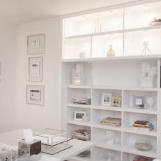 Contemporary Home Office With Custom Shelving and Lighting