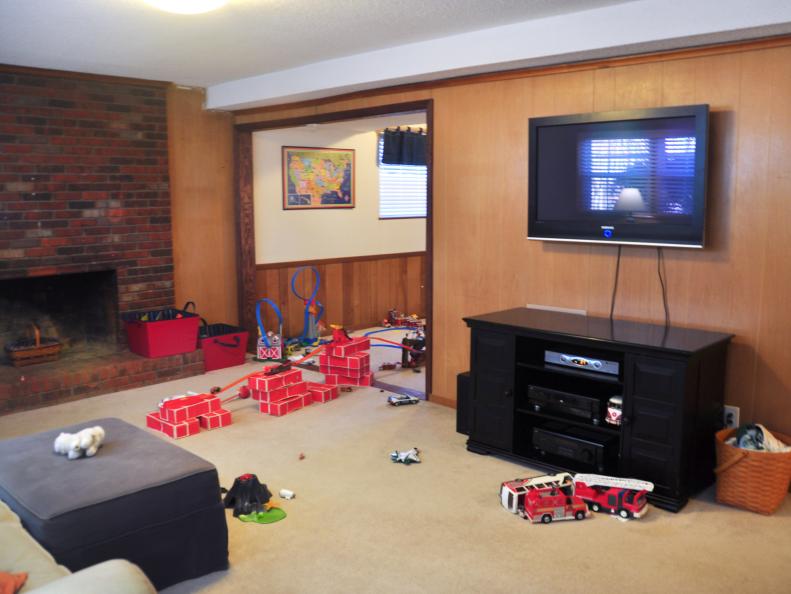 Old Carpet and Wood Paneling in Unorganized Family Room