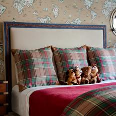 Kids Bedroom With Map Wallpaper and Plaid Bedding