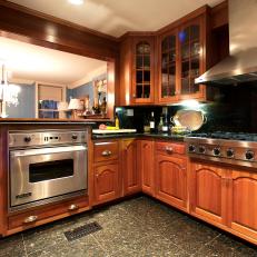 Traditional Kitchen With Warm Wood Cabinetry